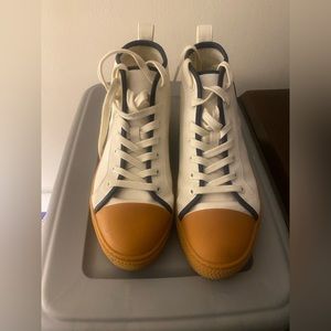 Gently worn ladies high top Tory Burch sneakers